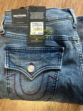 True Religion Men's Blue Denim Bootcut Jeans with Red Stitching